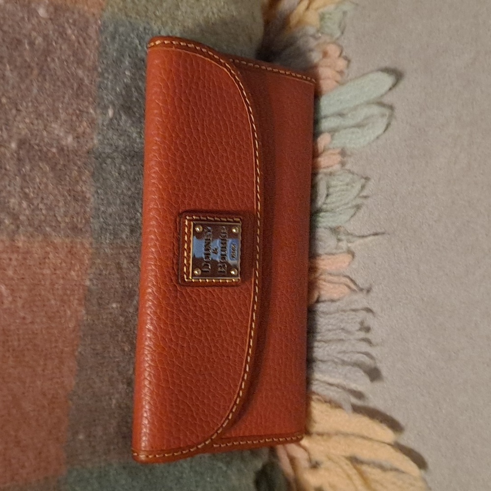 Dooney and Bourke Continental wallet in tan pebble leather